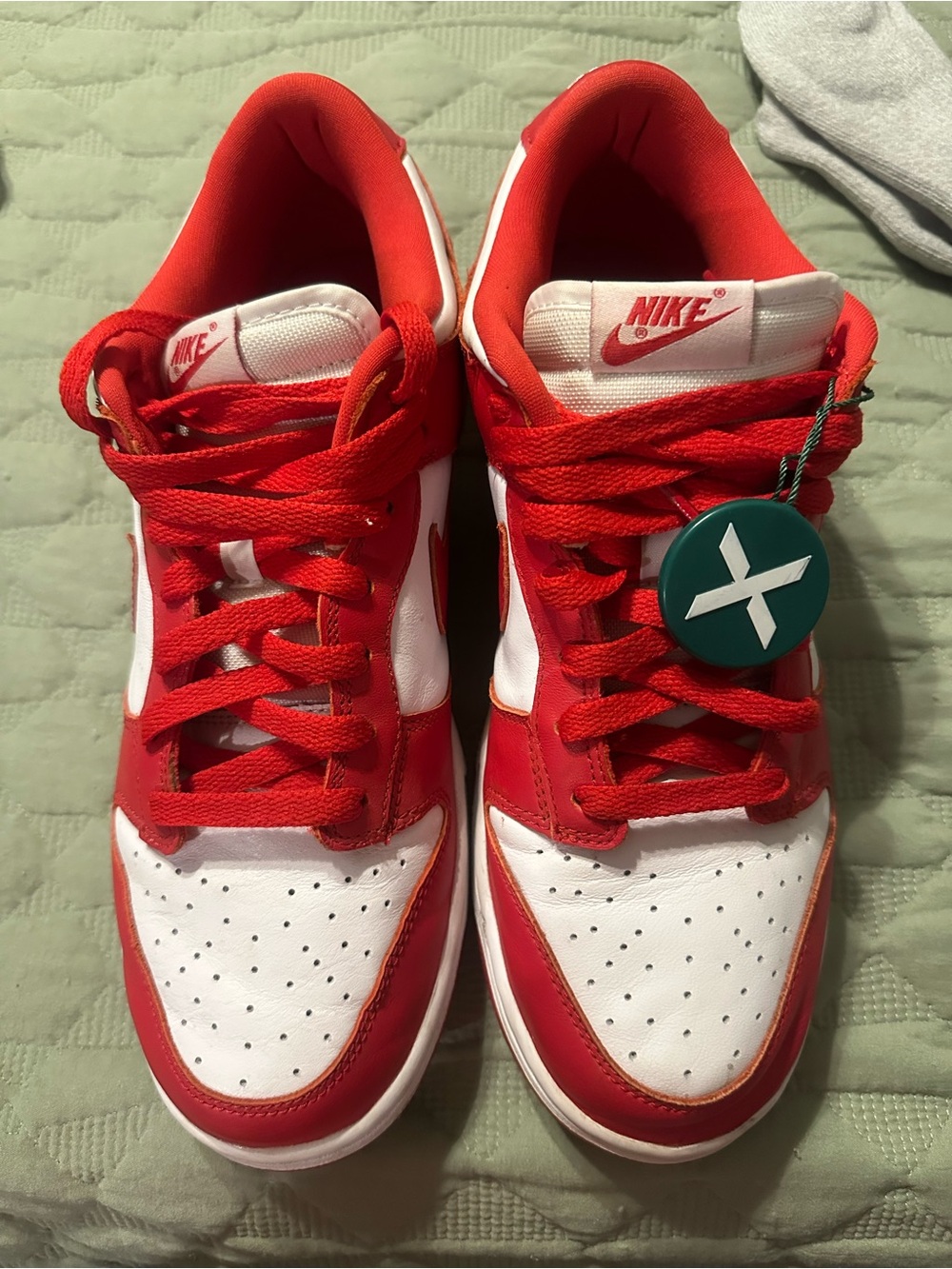 Nike men’s Red and White Low-Top Sneakers